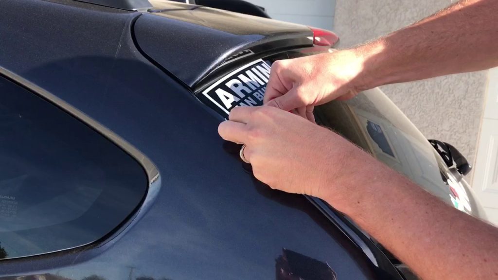 How to remove Custom printed Stickers from cars?